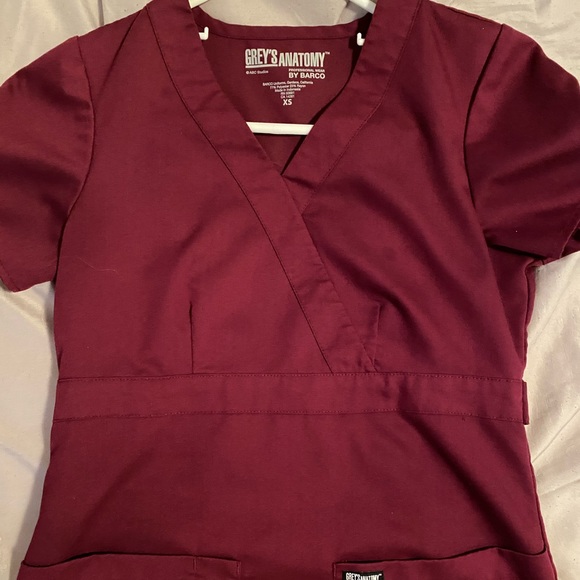 Scrub tops, jacket, and scrub bottoms. - Picture 1 of 5